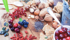 Superfood: variation of superfoods on wooden background